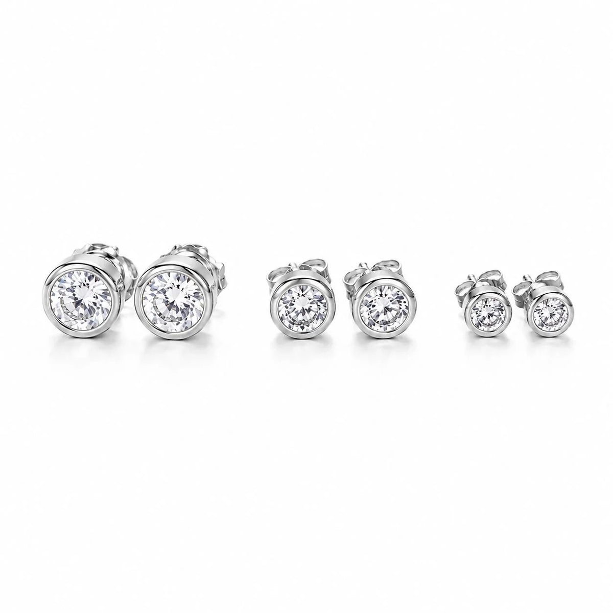 Classic bezel cubic zirconia stud earrings in rhodium finish, three sizes