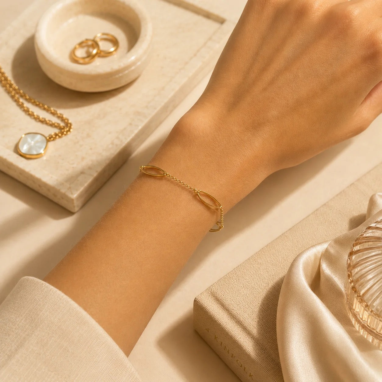 Delicate open link bracelet worn on wrist