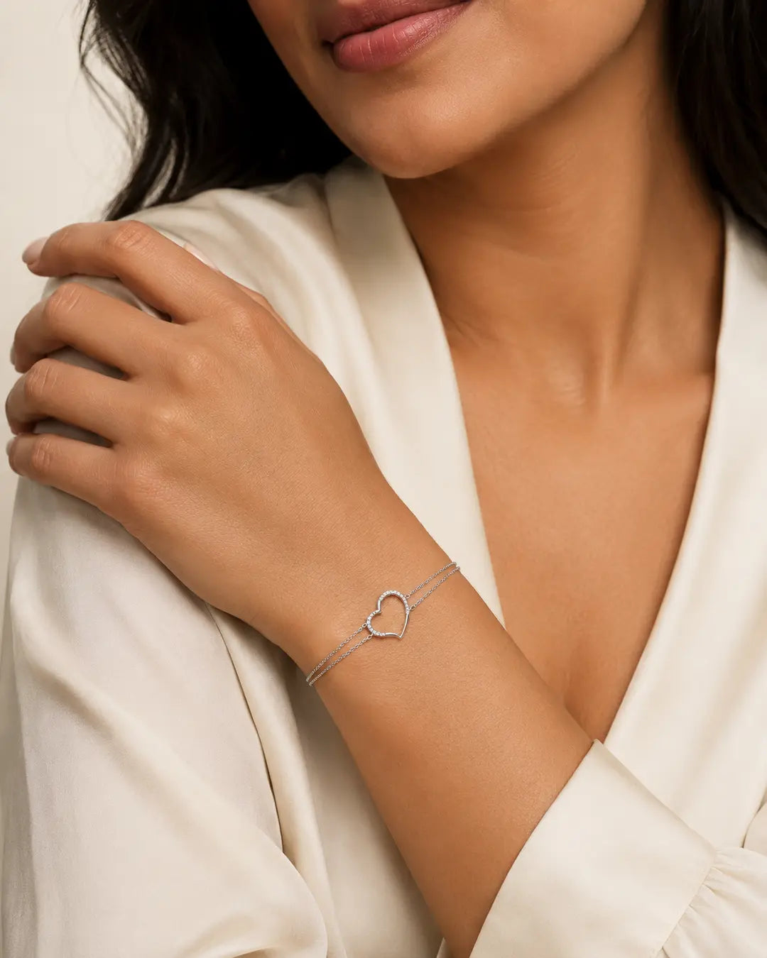 Diamond heart double chain bracelet on model in ivory
