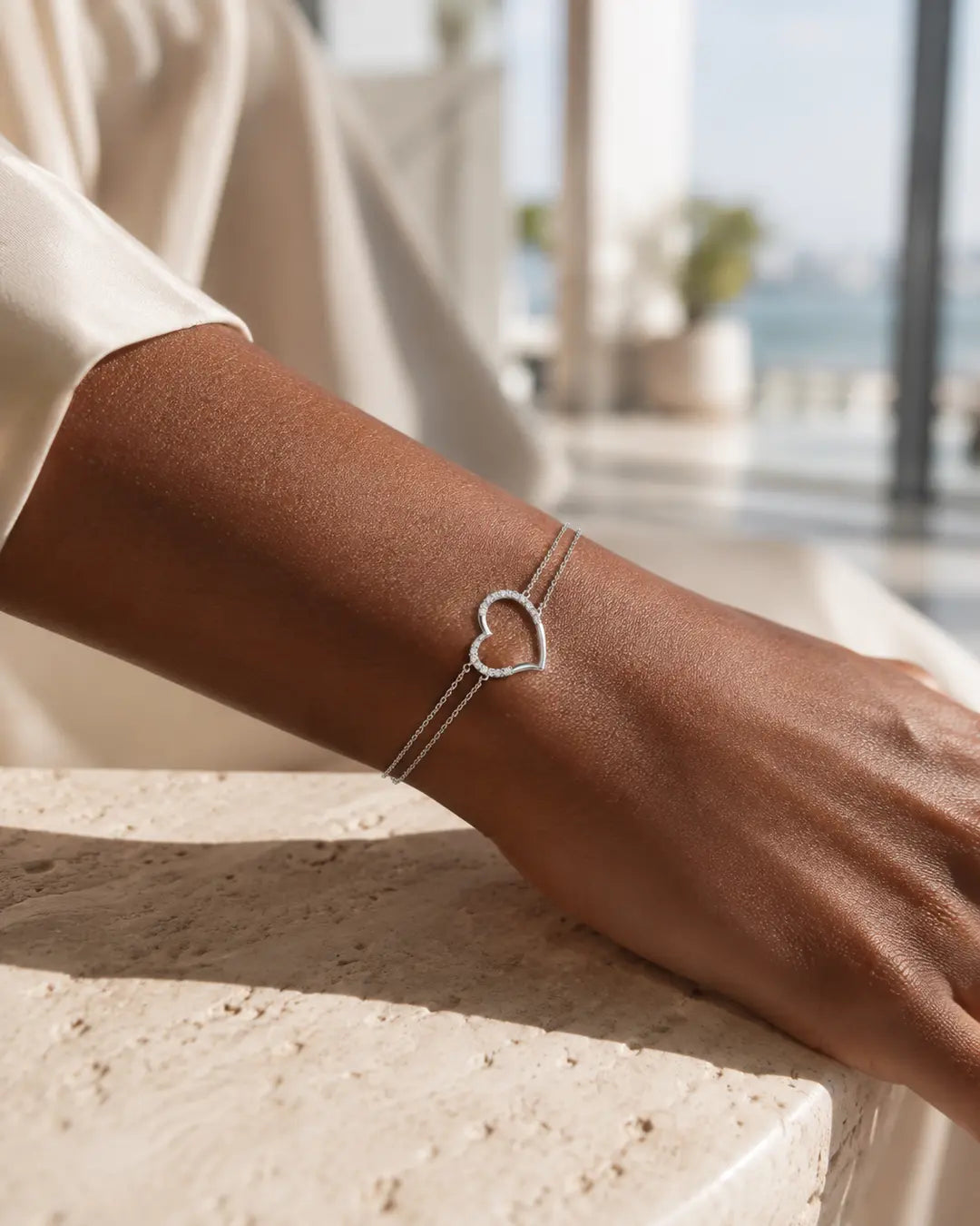 White gold diamond heart bracelet in Miami lifestyle setting
