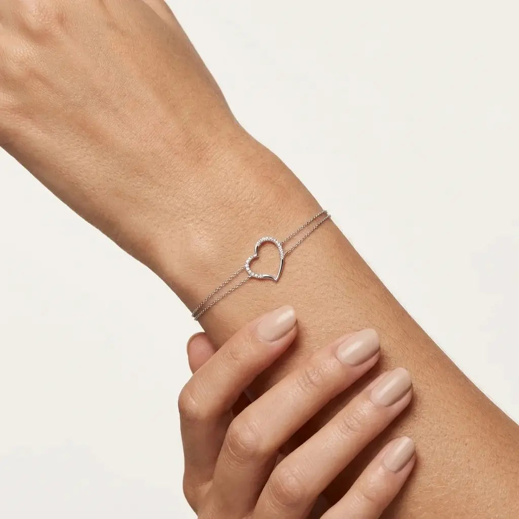 14K white gold diamond heart double chain bracelet worn on wrist