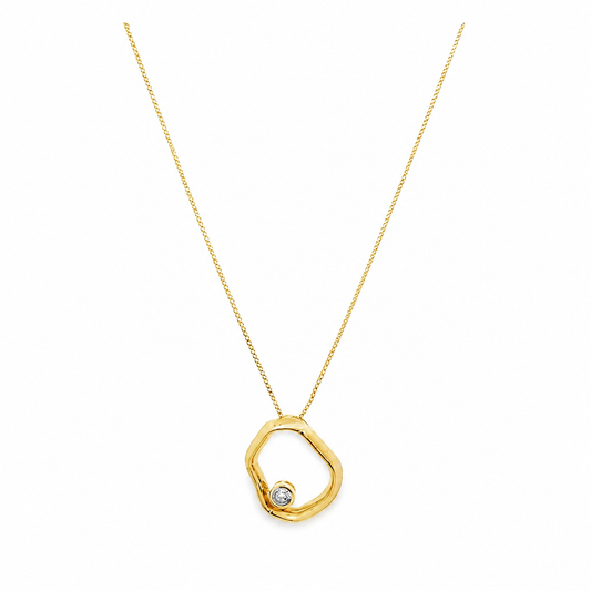 Geometric open circle cubic zirconia pendant necklace on a pure white background