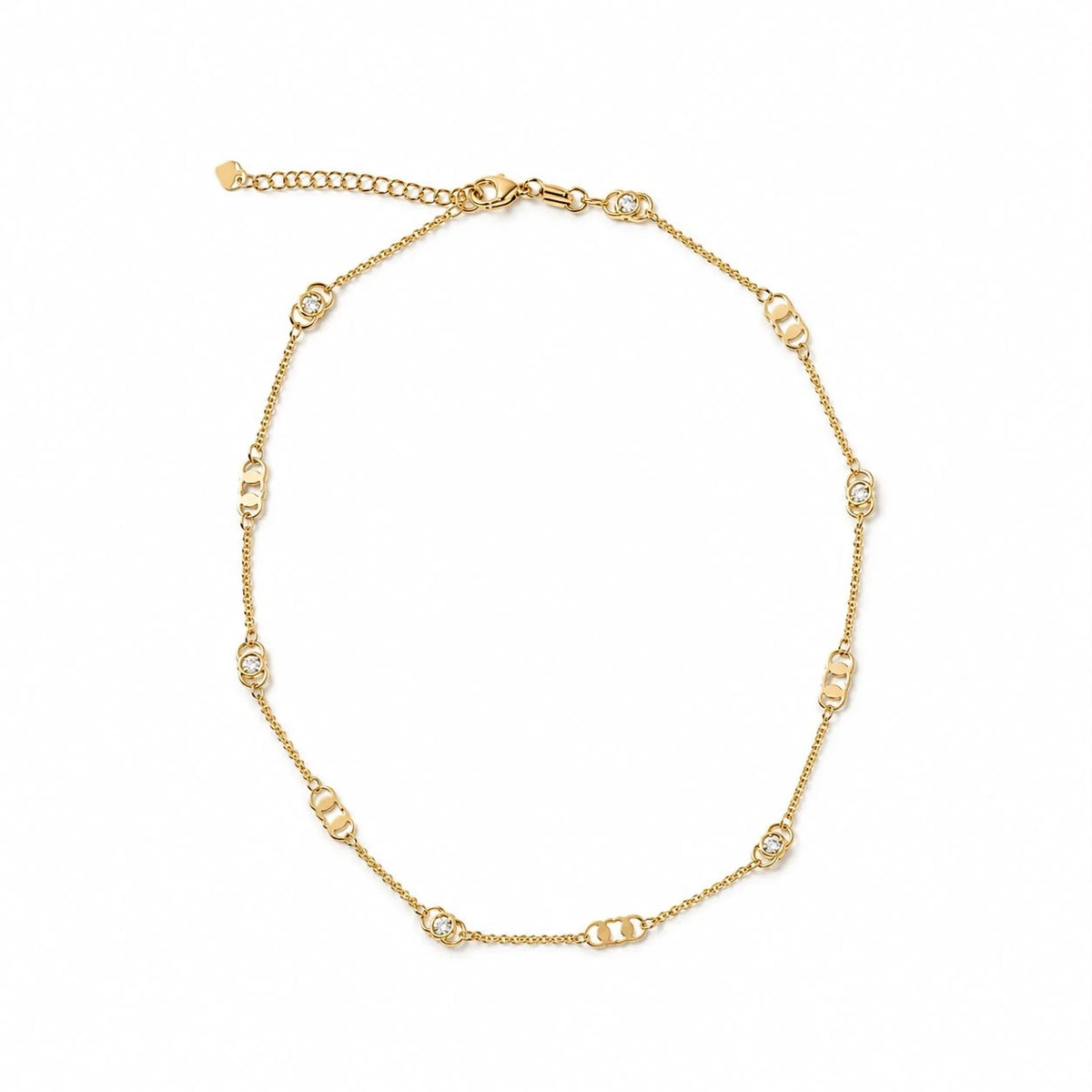 Geometric link and bezel cubic zirconia station necklace in gold finish