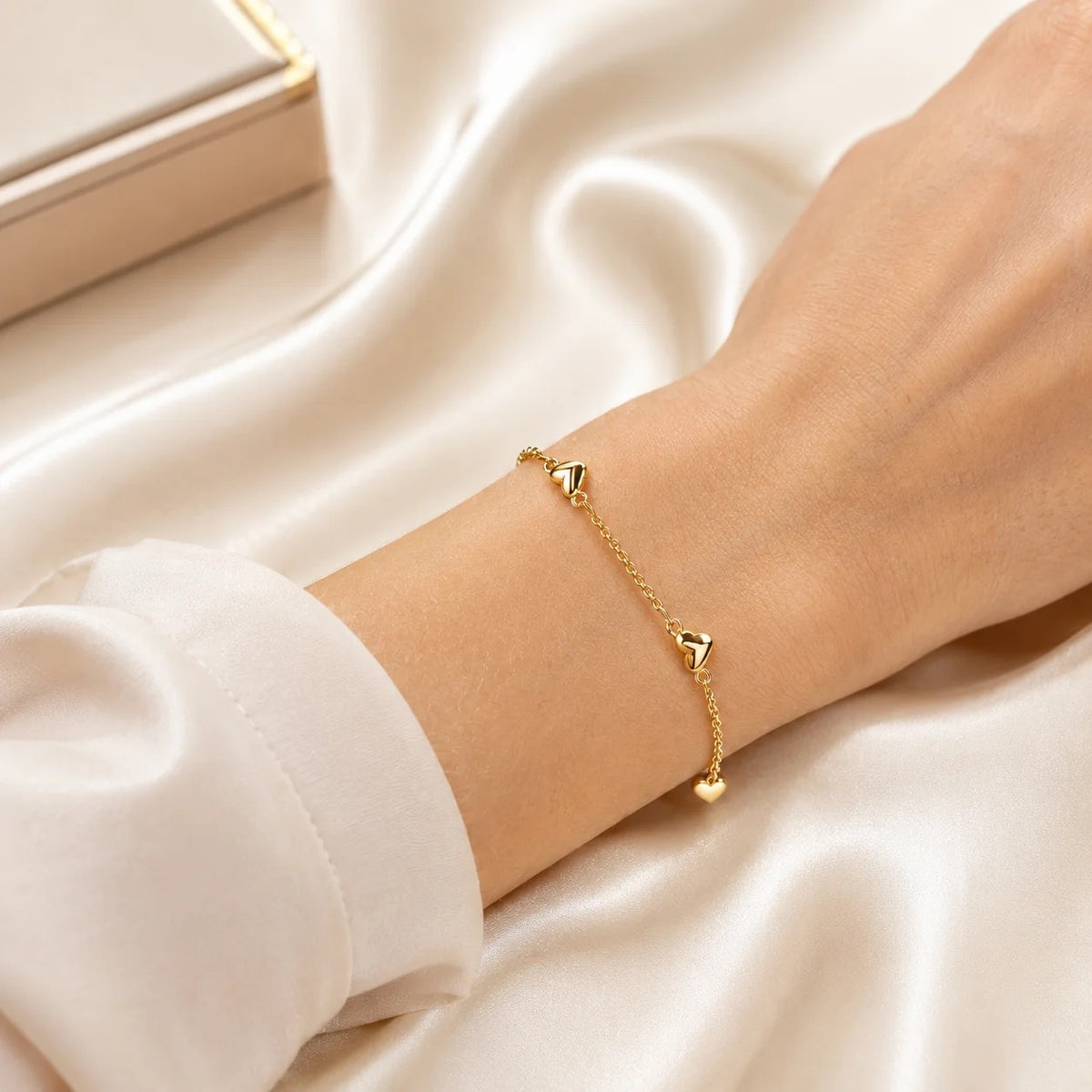 Multi heart station bracelet worn on wrist