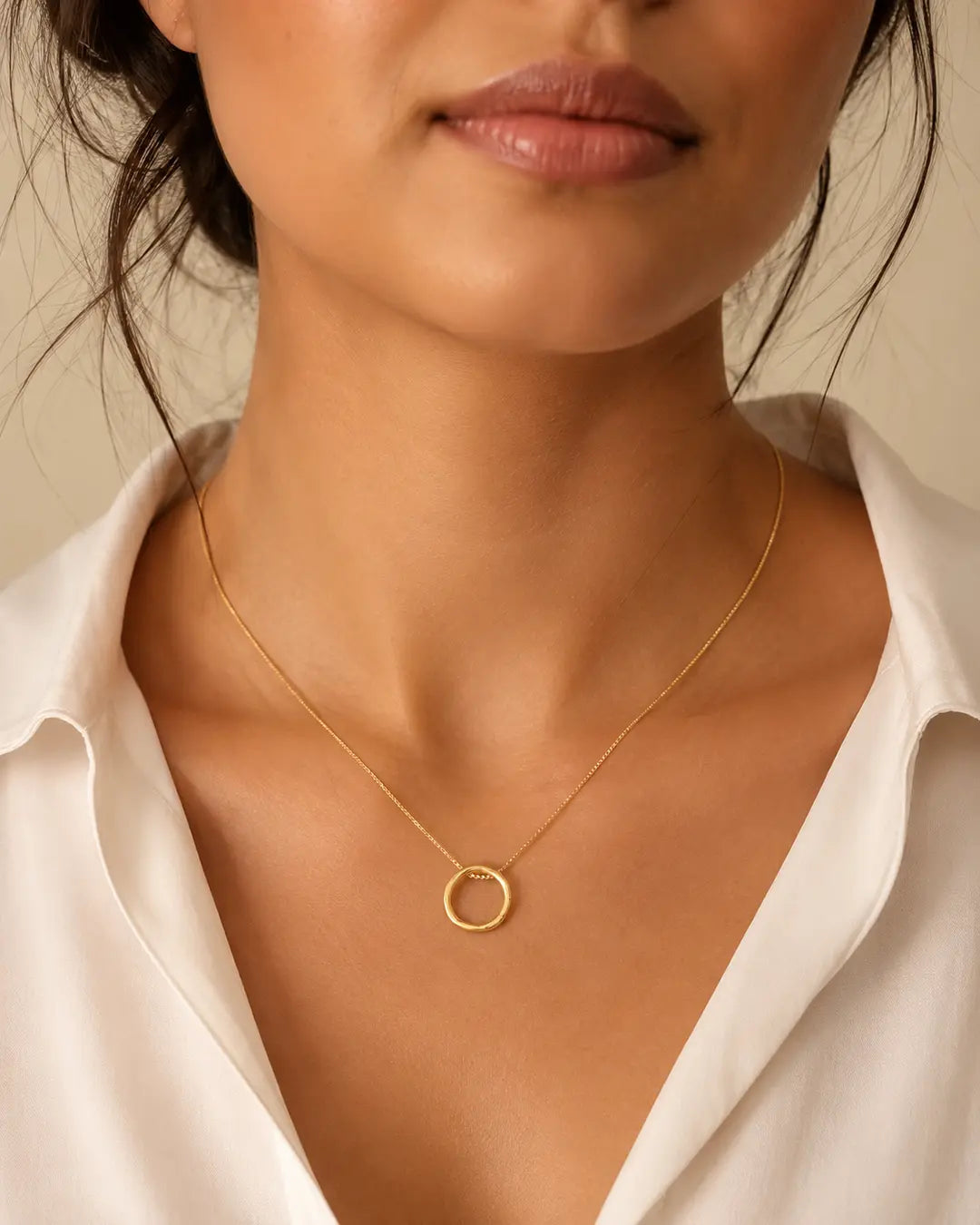 Model wearing the Organic Circle Pendant Necklace in gold-filled finish